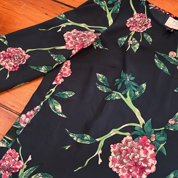 Floral print 3/4 length top with pink and green flowers. - Picture 3 of 5